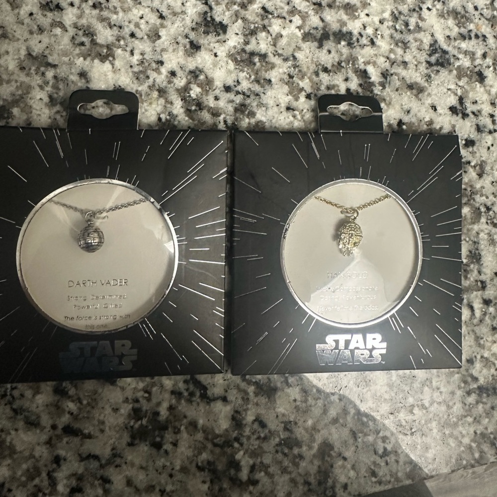 2 Star Wars salesone charms Han Solo and Darth Vader